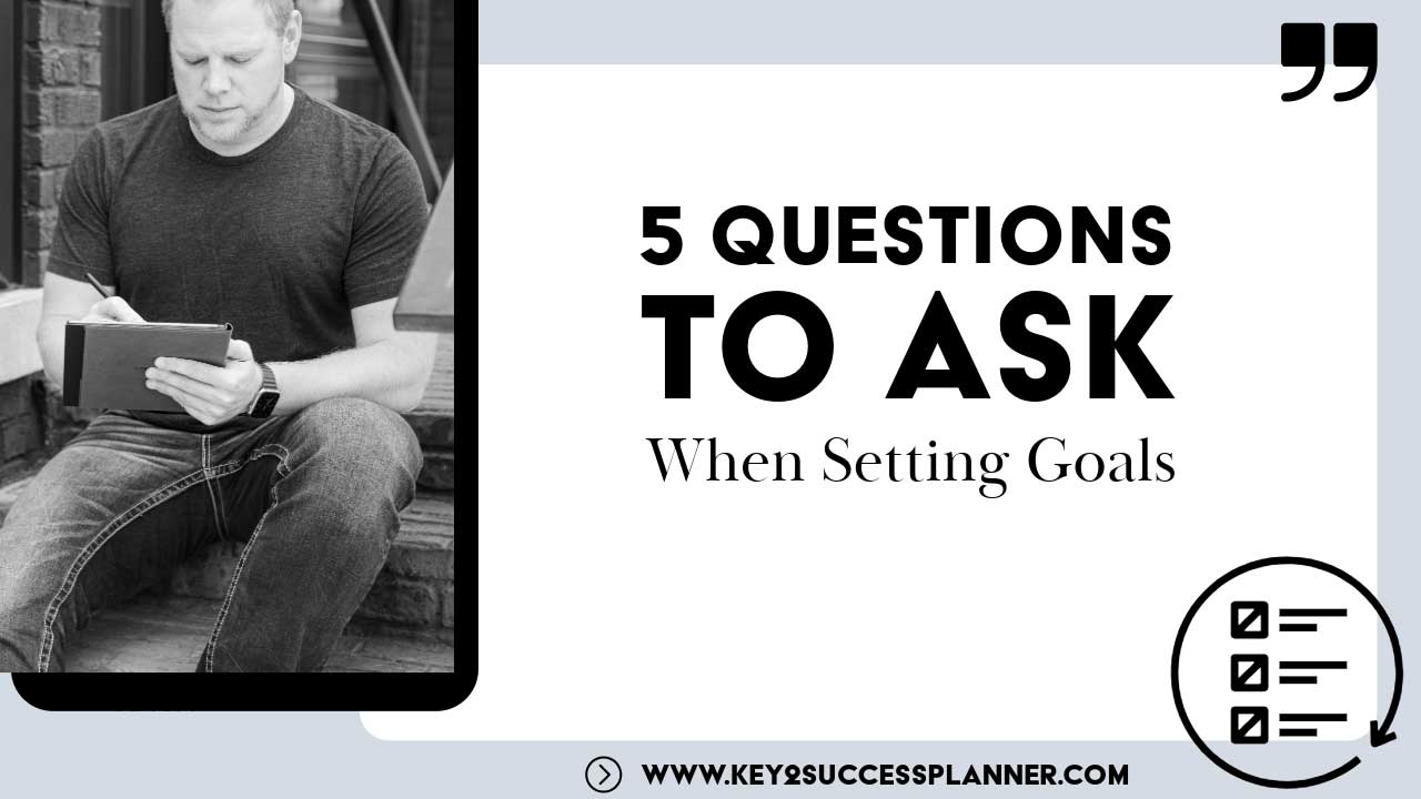 Man sitting on steps writing in a notebook, with the text "5 Questions to Ask When Setting Goals," emphasizing goal-setting strategies and identity alignment from Key2Success.