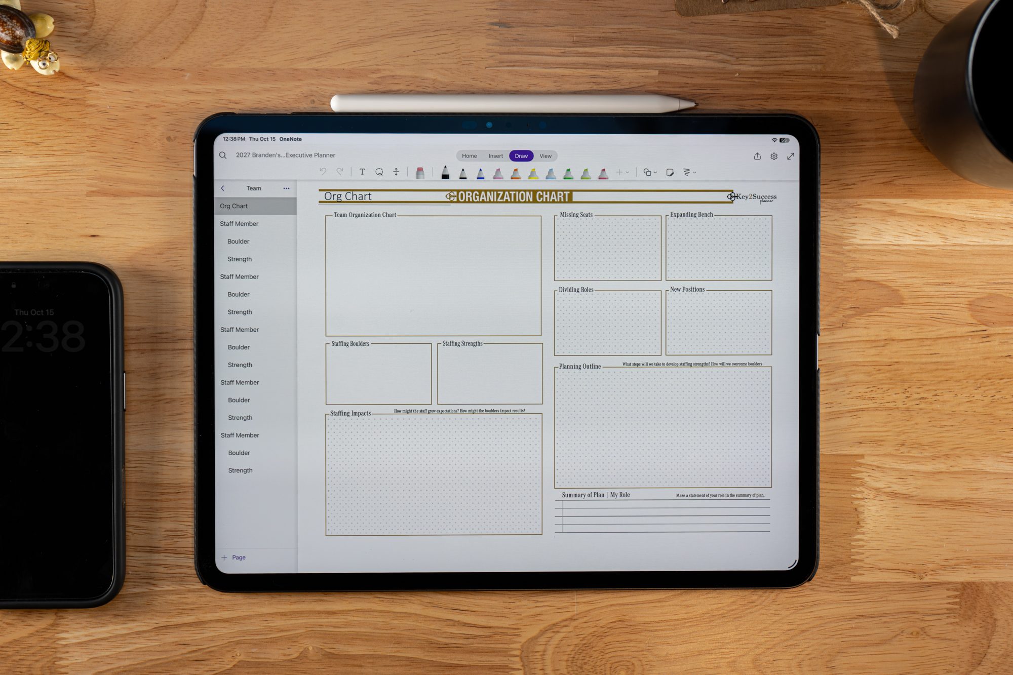 Business Operating System 6 Key2Success 2027 Organization Chart page with staff member, boulder and strength pages, on iPad in OneNote