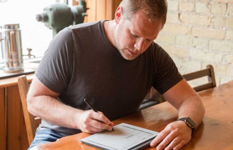 2025 onenote planner in use by Branden Bodendorfer at a coffee shop