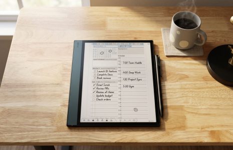 Onyx Boox 5c e-ink tablet open to Key2Success daily planner on a minimal focused workspace